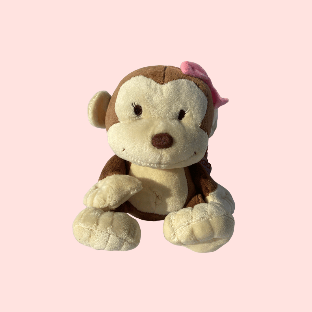 Peluche Monkey Chula Cafe con moño rosa Regala sentada